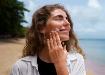 portrait-adult-woman-applying-sunscreen-lotion-sunburn-skin